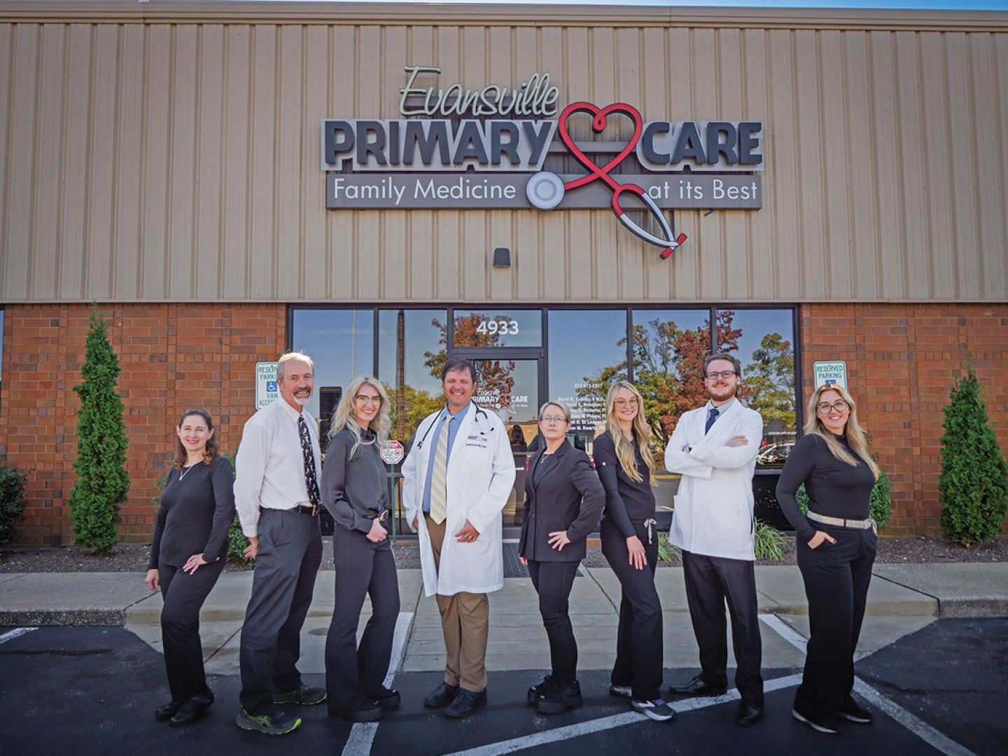 The Evansville Primary Care team standing outside their Evansville, Indiana office